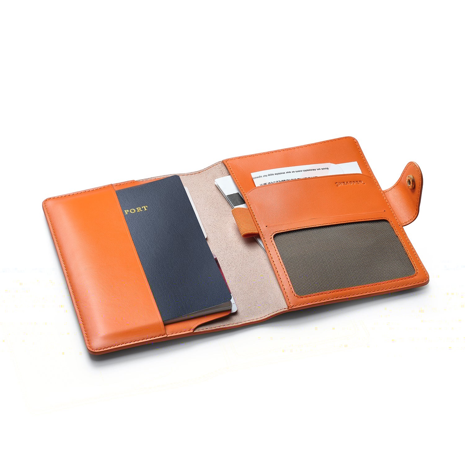 Sheaffer Emily in Paris Full-Grain Leather Passport Case with Pen Loop and Heart-Shaped Emblem - Orange.