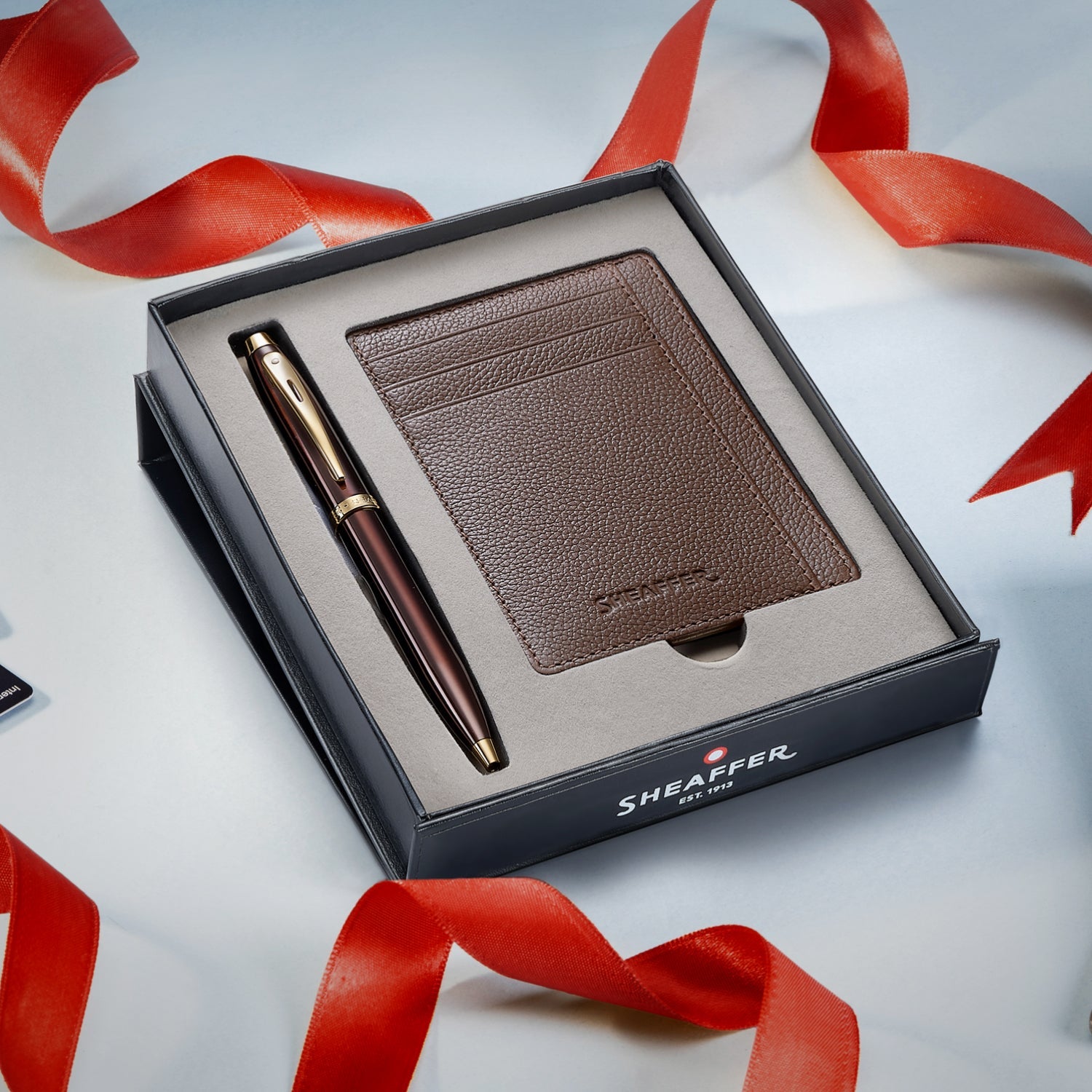 Sheaffer Gift Set ft. Glossy Brown 100 9370 Ballpoint Pen with Gold Trims and Rustic Mocha Credit Card Holder.